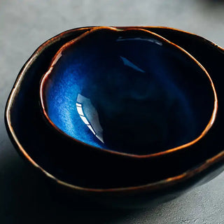 french cat eye bowl earthworks blue ceramic porcelain serving dish irregular shape side view