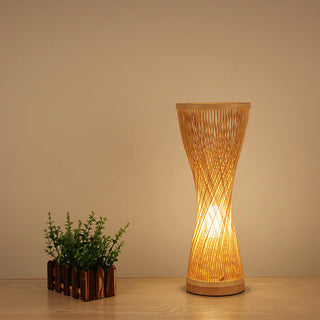 Woven bird nest table lamp front — natural cozy design