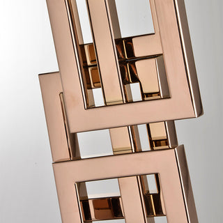 Luxury bronze geometric lamp — close-up elegant detail