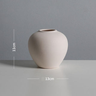 white ceramic vase modern graffiti art living room decoration close-up 2