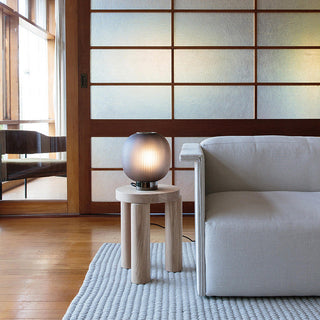 Ambient ball lamp illuminated — elegant warm glow interior