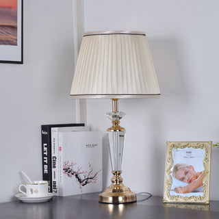 Ivory crystal bedside lamp — luxury metallic accents design