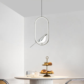 LED pendant with sculptural gold bird and oval shade