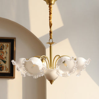 Copper flower chandelier ambient — large brass resin warm glow