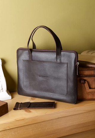 leather laptop sleeve 13 inch crust leather handles front pocket lifestyle view