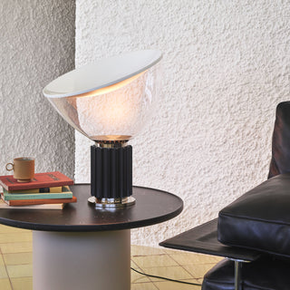 Black aluminum lamp close-up — minimalist gloss reflector