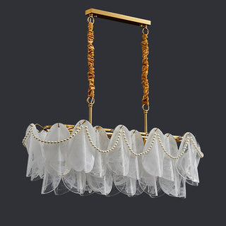 Luxury cloud chandelier illuminated — frosted glass pendant warm