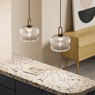Pendant with pumpkin-shaped clear glass and iron frame