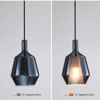 Multicolored glass pendant light over dining table
