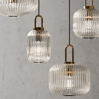 Pumpkin-shaped clear glass pendant with iron frame