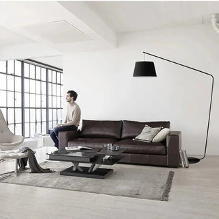 GRANV large arc lamp – dark brown over plush sofa