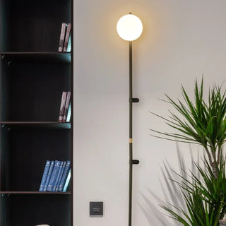 Plug-in glass globe wall sconce G9 black – 100cm stem front view