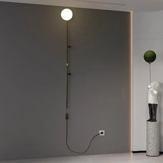 Glass globe sconce installed – modern dining room warm 3000K