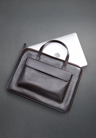 leather carry case full-grain leather bag macbook pro 16 front pocket organizer lifestyle view