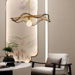Rattan wave pendant close-up — modern boho ceiling lamp