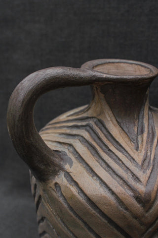 handmade pottery pitcher rustic ceramic jug smoke fired ceramics design angle view