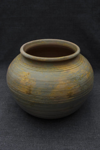 handmade pottery pitcher rustic ceramic water jug artisan signed clay vessel close-up