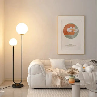 HUPON two-globe floor lamp – black metal base detail