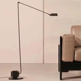 CALSE black articulated floor lamp – in home office