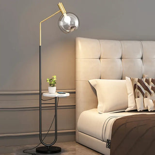 DORET elegant black and gold floor lamp with integrated shelf – full view