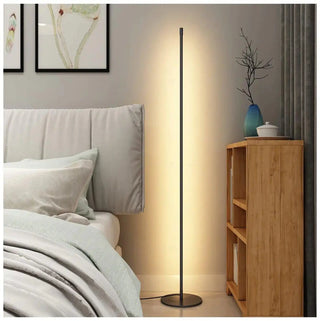 CHAMA LED floor lamp – lit in contemporary living room