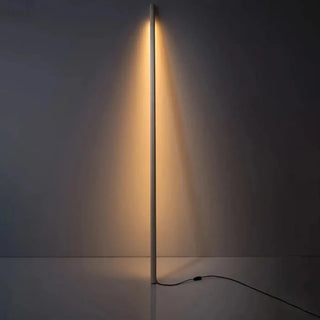 DARSIS floor lamp – warm ambient light in bedroom