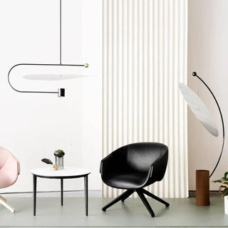 RONDY floor lamp – near black leather pivoting chair