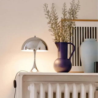 SILVY Contemporary Chrome Bedside Lamp - in bedroom setting