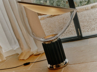 Minimalist desk lamp detail — black aluminum white reflector