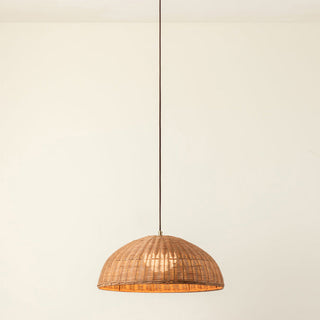 Natural rattan pendant in bohemian-style interior