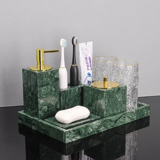 green marble luxury bathroom set soap dispenser toothbrush holder close-up