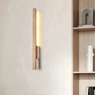 Minimalist stone halo wall sconce installed warm 3000K