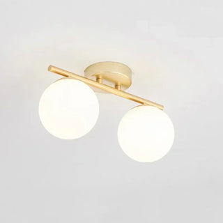 NAIDE Gilded Support Ceiling Light – White Ball Shades Detail