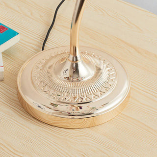 Colored agate table lamp illuminated — tree iron warm