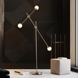 White glass orb lamp close-up — swing arm LED detail