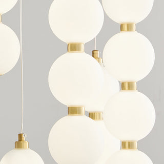 Modern white globe pendant warm LED copper accent dining room