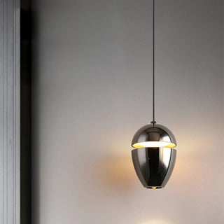 Cozy bedside pendant from above — small bedroom ceiling lamp