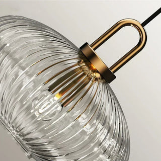 Iron pendant with pumpkin glass shade and adjustable cord