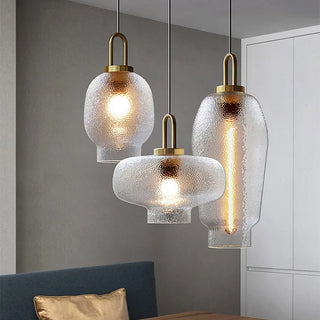 Brass frosted pendant detail — glass modern kitchen fixture