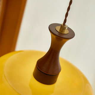 Kitchen pendant with retro yellow dome and wood