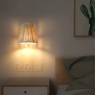 Natural rattan wall sconce warm white 3000K close-up