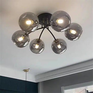 RITOSA Gilded Ceiling Light – Clear Glass Sphere Room Setting Interior