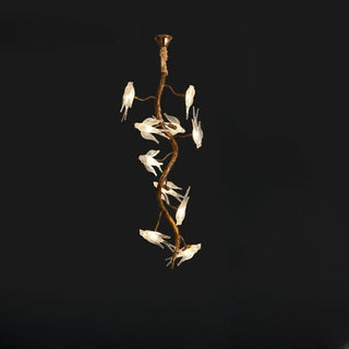 Sculptural branch pendant lamp in interior — decorative gold ceiling light