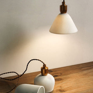 Ceramic pendant with brushed brass finish — classic design