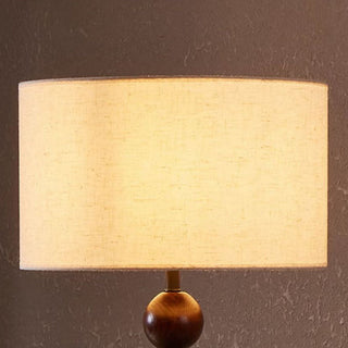 Medieval floor lamp barbell — wood metal fabric detail