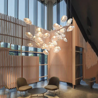 Floating pebble pendant light close-up, modern soft diffused hanging ceiling lamp