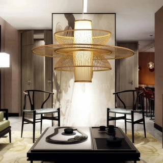 Geometric bamboo pendant illuminated — sustainable artisan hanging light
