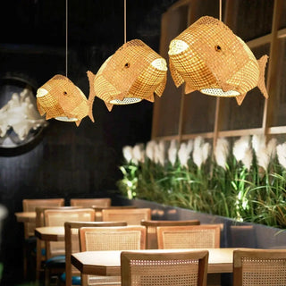 Fish-shaped bamboo pendant illuminated — playful bedroom ceiling light