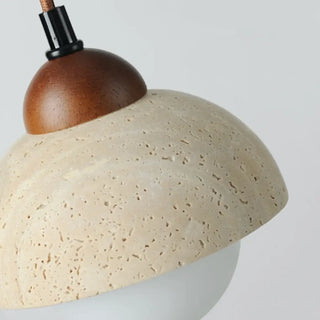 Travertine accent pendant lamp close-up — luxury wood and glass light