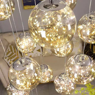 Gold crystal waterfall pendant detail — designer luxury ceiling lamp